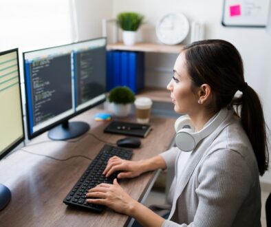 Side view of a freelance working at home Jasa Pembuatan Website Sidoarjo